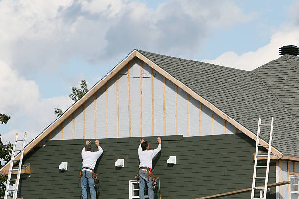 Professional Siding Installation technician working in Cary, NC